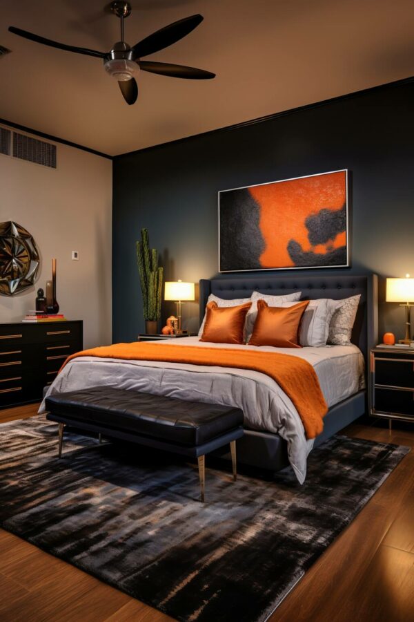 A Modern Bedroom With Graphite Walls And Orange Accents, Featuring A Plush Abstract-Patterned Area Rug.