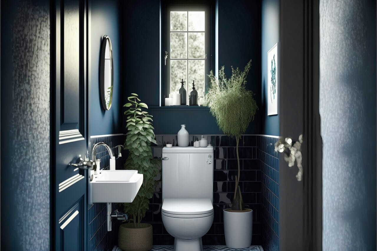 Scandinavian Bathroom: A Dark And Moody Bathroom With Navy Blue Walls And White Tile Floors. A Sleek White Sink With A Chrome Faucet Is Centered In The Room And A Modern White Toilet Rests Against The Wall.